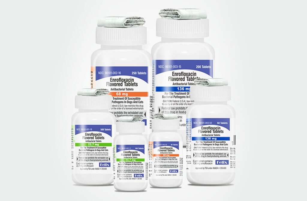 A group of white bottles of Enrofloxacin Flavored Tablets of varying dosage strengths.