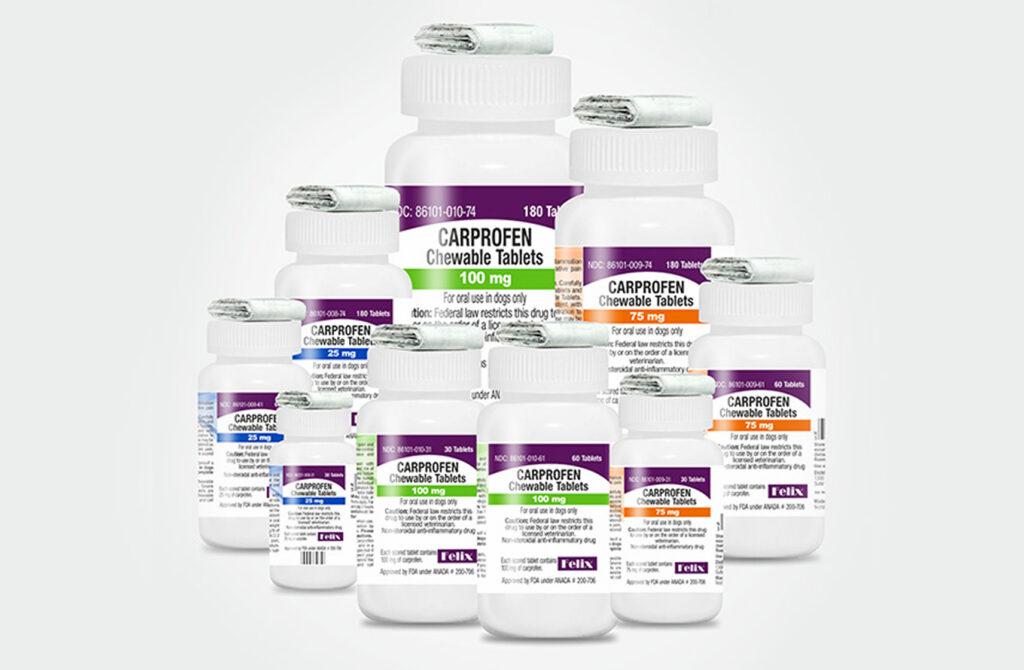 Nine white bottles of Carprofen Chewable Tablets for dogs showing different dosages from 25 mg to 100 mg.