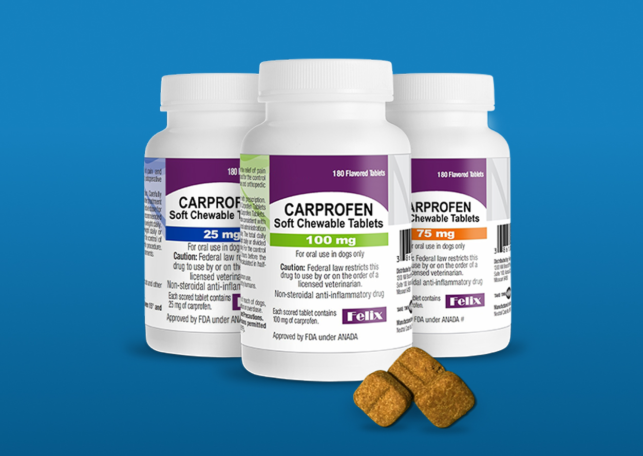 Three bottles of Carprofen Soft Chewable Tablets for dogs, showing 25 mg, 100 mg and 75 mg dosages, with three brown chewable tablets in the foreground.