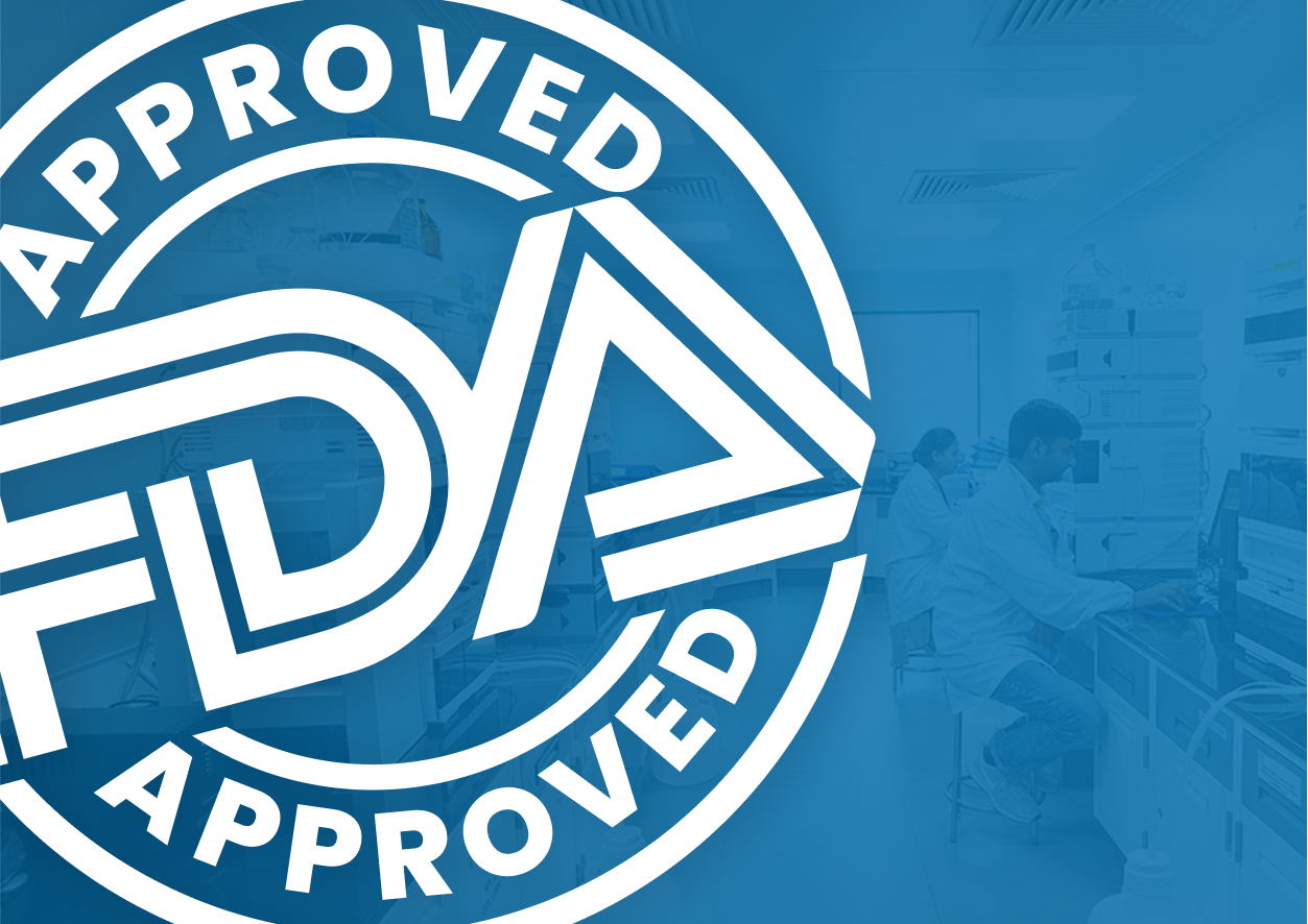 A white 'FDA APPROVED' seal logo overlaid on a blue-tinted background.