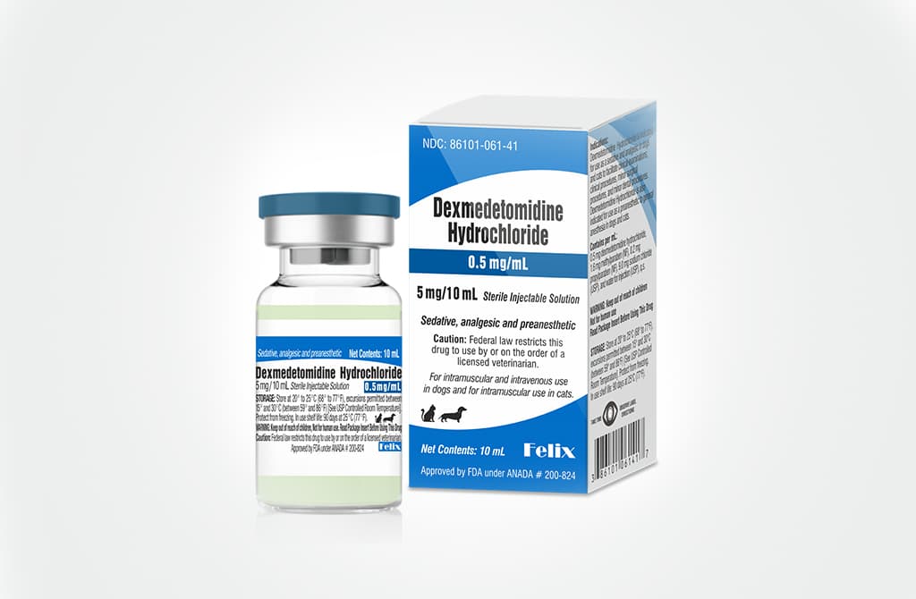 A 10 mL glass vial and matching blue-and-white display box for Dexmedetomidine Hydrochloride sterile injectable solution.