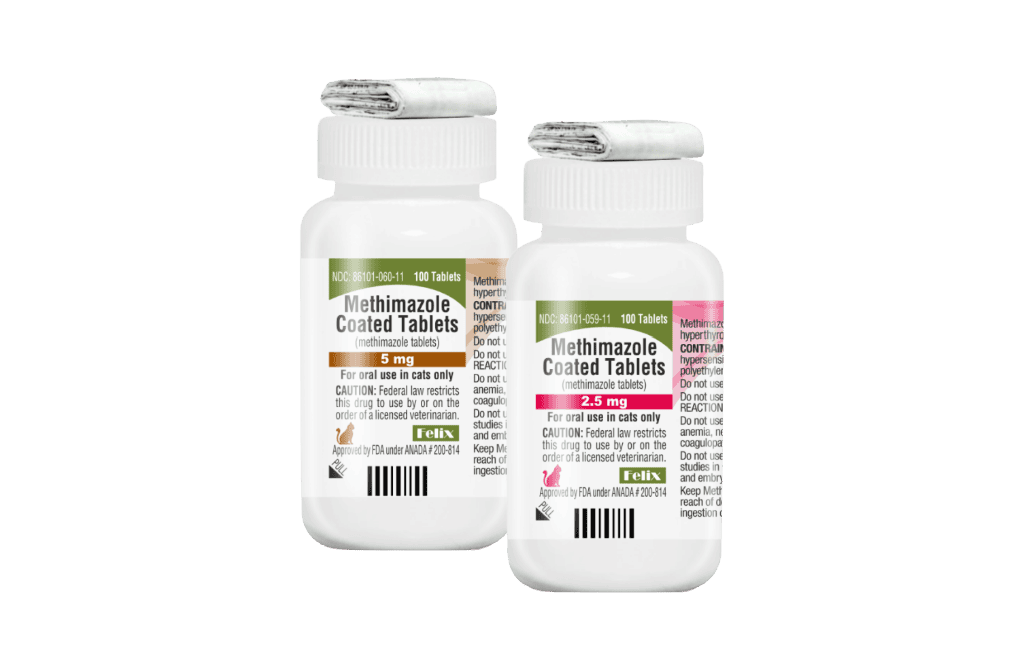 Two white plastic prescription bottles of Methimazole Coated Tablets for cats, showing a 5 mg strength bottle next to a 2.5 mg strength bottle.